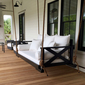 Black Charleston Bed Swing with white cushions